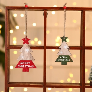 Handcrafted wooden Christmas tree ornaments with Merry Christmas text in red and green colors