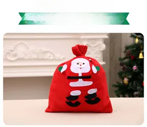 Petit sac cadeau de Noël avec applique Père Noël 3D et fermeture à cordon rouge