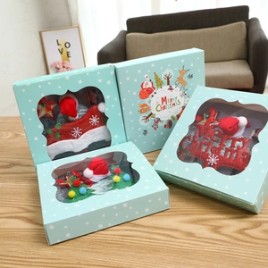 Coffret cadeau de Noël 4 pièces bleu clair avec bonnets de Père Noël et arbres à paillettes