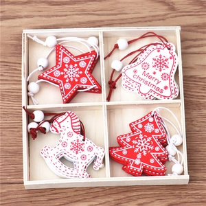 Set of 12 red and white wooden Christmas ornaments in a natural wooden gift box