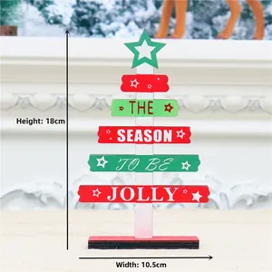 Detail view of mini wooden DIY Christmas tree tabletop decor with size dimensions 18x10.5cm