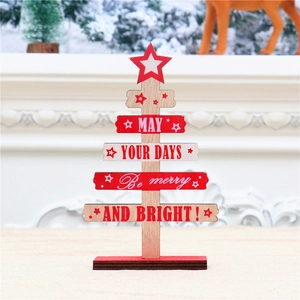 Macro detail of wooden Christmas tree tabletop decor with festive English greeting text