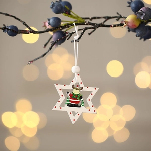 DIY Christmas wooden star ornament with reindeer illustration and festive red polka dots