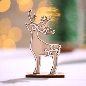 Laser-cut wooden reindeer ornament with hollow patterns and stable base for Christmas decor