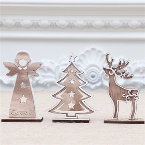 Detailed view of laser-cut wooden Christmas ornaments with hollow star patterns