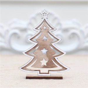 Detail of laser-cut wooden Christmas tree ornament with star hollow and thick base