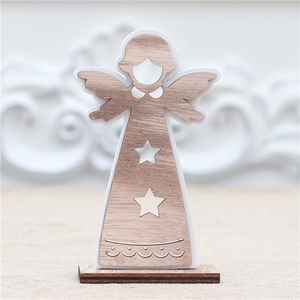 Detailed view of an angel wooden ornament with star cutouts and a solid wood base