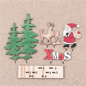 Vue à plat d'un kit de Noël en bois DIY avec rennes et Père Noël sur base en toile