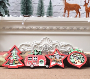 Set of four 3D wooden Christmas ornaments featuring Santa and reindeer in festive scenes