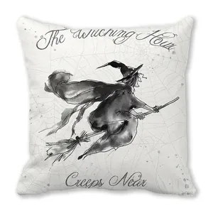 Close-up of Halloween peach skin pillowcase featuring a flying witch and spider web