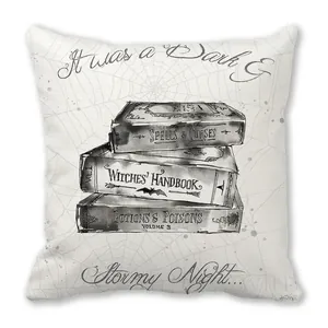 Detail of Halloween pillowcase featuring vintage magic book illustrations and spider webs