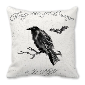 Detail of artistic black crow and spider web print on Halloween peach skin pillowcase