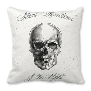 Detail of Halloween skull sketch and spider web art on peach skin cushion cover