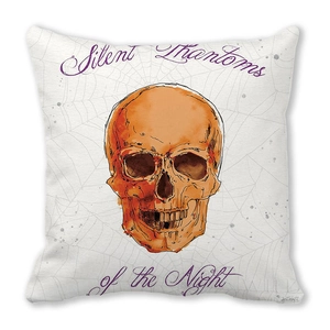 Detail of Halloween skull and spider web print on square peach skin cushion cover