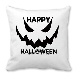 Close-up of Happy Halloween pillowcase with pumpkin face on white peach skin fabric