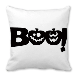 Detail of soft peach skin Halloween pillow cover with Boo and pumpkin design