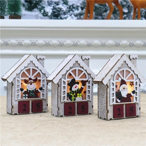 Detail of wooden Christmas countdown calendars with LED lights and festive characters