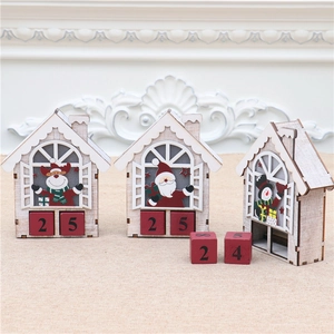 Detail of wooden Christmas countdown calendar ornaments with reindeer and Santa figures