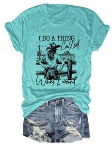 Flat lay of a turquoise graphic T-shirt with western print and distressed denim shorts