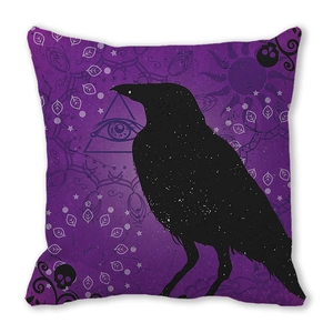 Detailed view of mystical raven print and all-seeing eye on purple gothic cushion cover