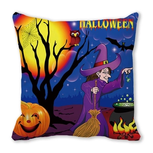 Close-up of Halloween pillow cover featuring watercolor witch, pumpkin, and bat designs