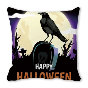 Detail of Halloween pillow case with crow, tombstone and moon graphic on white background