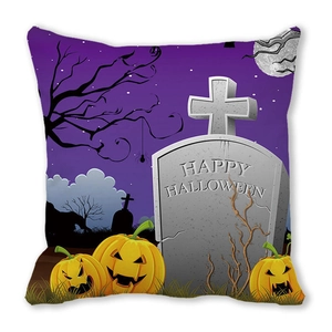 Detailed view of Halloween pillowcase featuring orange pumpkins and spooky tombstones