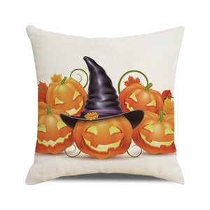 Close-up of Halloween pumpkin wizard pattern on textured cotton linen pillowcase