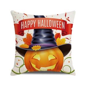 Detail of Happy Halloween pumpkin watercolor print on beige linen pillowcase