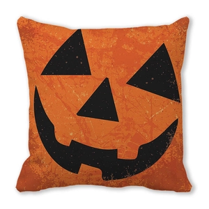 Detail of Halloween pillow case with vintage cracked pumpkin jack-o-lantern face print