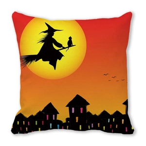 Detail of Halloween pillow case with black cat, witch on broom and orange moon print