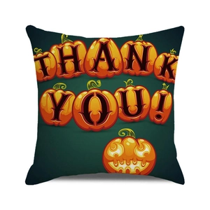 Detail of Halloween pillow cover featuring a pumpkin Thank You design on dark green fabric