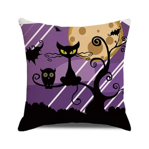 Detail of Halloween throw pillow case showing black cat and owl silhouette on purple background