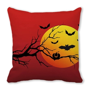Detail of Halloween pillow case with orange moon, bats and pumpkin on red background