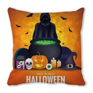 Close-up of Halloween pillow cover featuring vibrant pumpkin, skull, and witch hat print