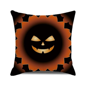 Halloween decorative pillow cover with glowing pumpkin face design on black background