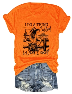 Detail of orange cotton T-shirt with Western print and distressed denim shorts