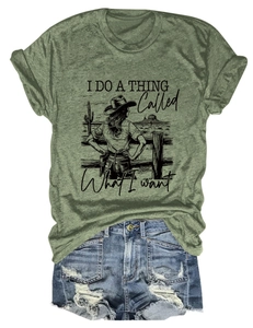 Flat lay of army green graphic T-shirt with denim shorts showing distressed details