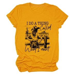 Detail of mustard yellow t-shirt with desert theme print and motivational quote