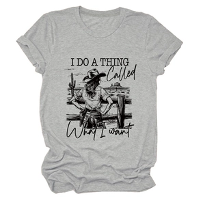 Close-up of heather grey t-shirt featuring Western woman illustration and slogan print