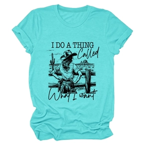 Detail of teal cotton T-shirt featuring retro cowgirl graphic and typography text