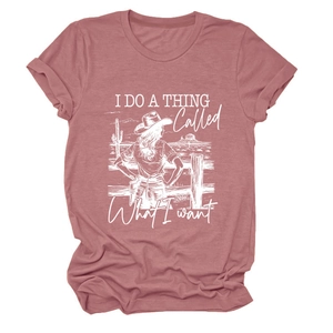 Detail of crew neck t-shirt with retro western female print in dusty rose color