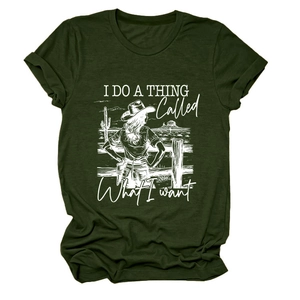 Detail of dark green cotton T-shirt featuring a white Western-style desert graphic and text