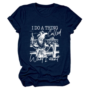 Detail of navy blue cotton t-shirt featuring a white desert landscape and slogan print