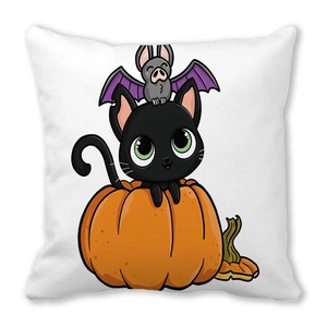 Detail of square Halloween cushion cover featuring cartoon black cat in pumpkin design