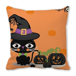 Detail of Halloween pillowcase featuring black cat with wizard hat and pumpkins on orange