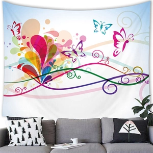 Vibrant butterfly and floral heart tapestry hanging over a modern grey sofa