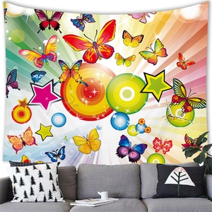 Detail of butterfly and rainbow wall tapestry hanging above a modern living room sofa