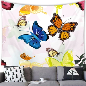 Detail of colorful butterfly tapestry hanging above a modern sofa in a living room