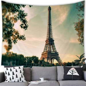 Detail of Eiffel Tower tapestry at sunset used as a warm living room wall hanging decor